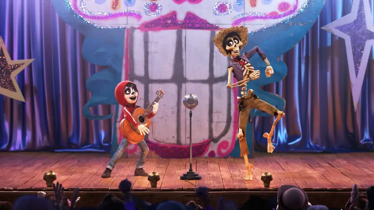 COCO (Pictured) – UN POCO LOCO – In Disney•Pixar’s “Coco,” aspiring musician Miguel (voice of Anthony Gonzalez) teams up with a charming trickster named Héctor (voice of Gael García Bernal) to unravel a generations-old family mystery. Their extraordinary journey through the Land of the Dead includes an unexpected talent show performance of “Un Poco Loco,” an original song in the son jarocho style of Mexican music written by co-director Adrian Molina and Germaine Franco for the film. “Coco” opens in U.S. theaters on Nov. 22, 2017. ©2017 Disney•Pixar. All Rights Reserved.
