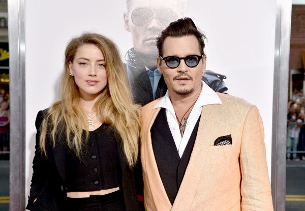 Amber Heard y Johnny Depp están en plena batalla legal. Foto: (Getty)